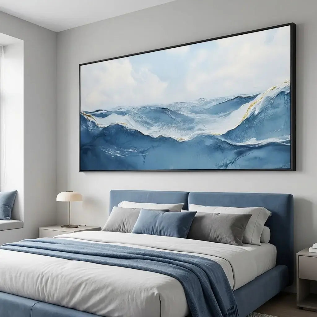 Modern bedroom with a large abstract ocean painting on the wall.