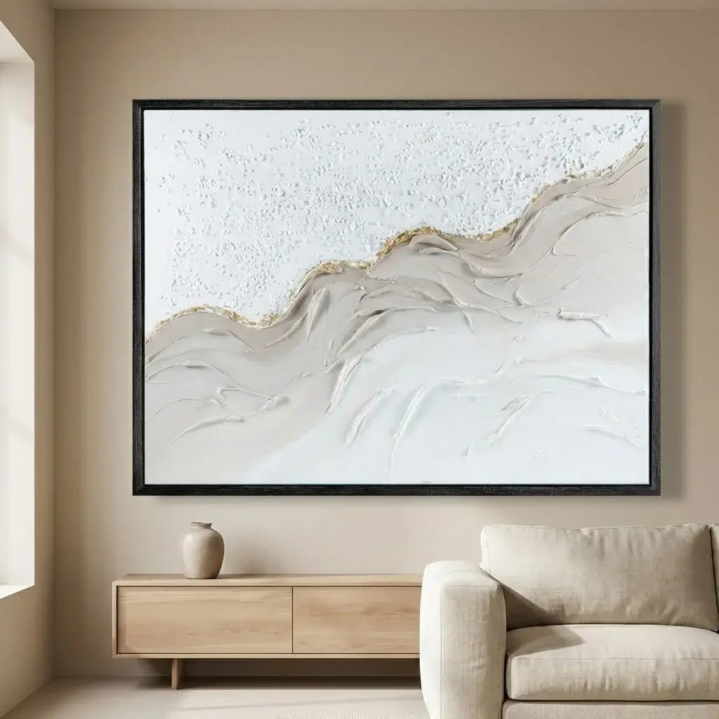 Abstract wall art in a modern living room setting with a sofa and side table.
