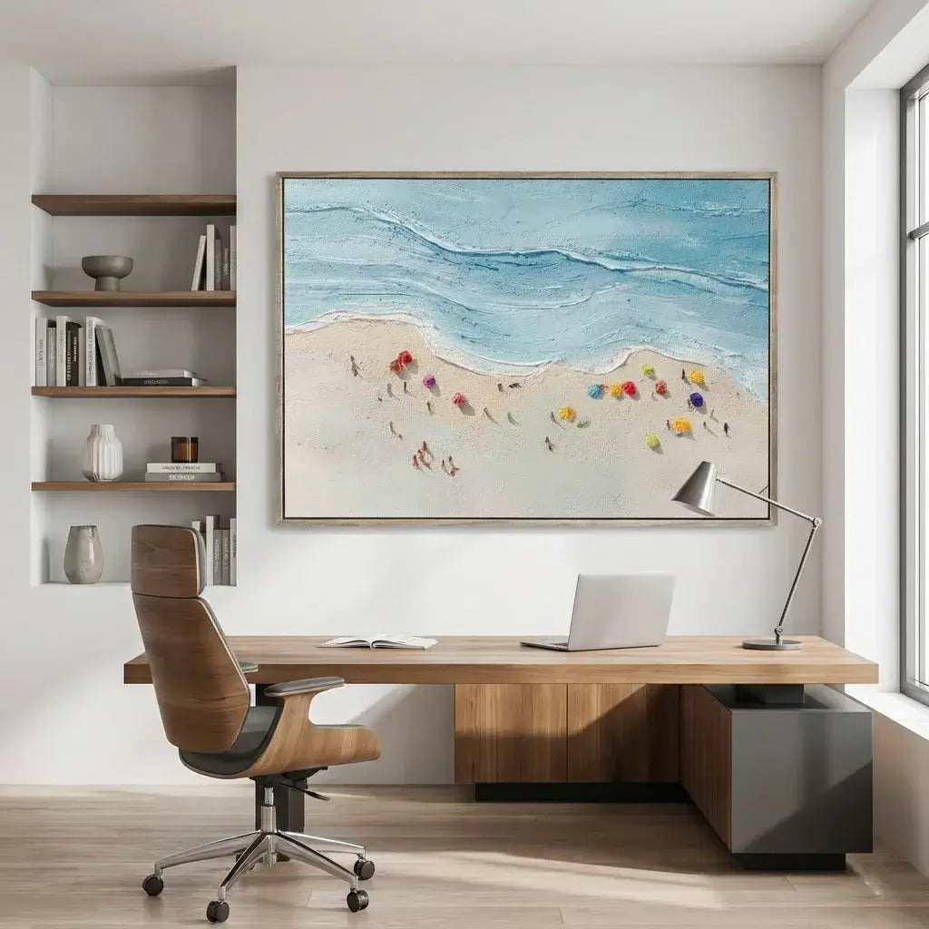 Modern office with wooden desk, chair, and wall art of a beach scene.
