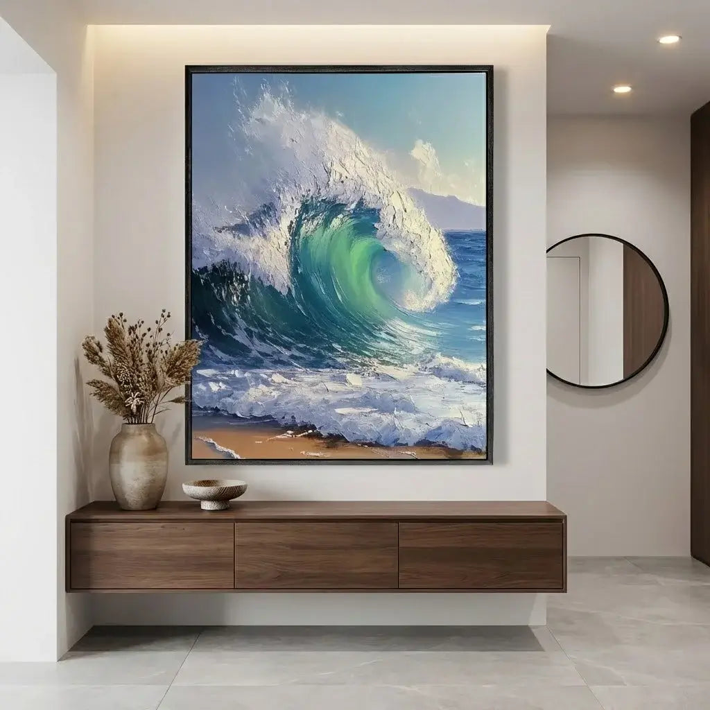 Framed artwork of a wave on a wall above a wooden console table.