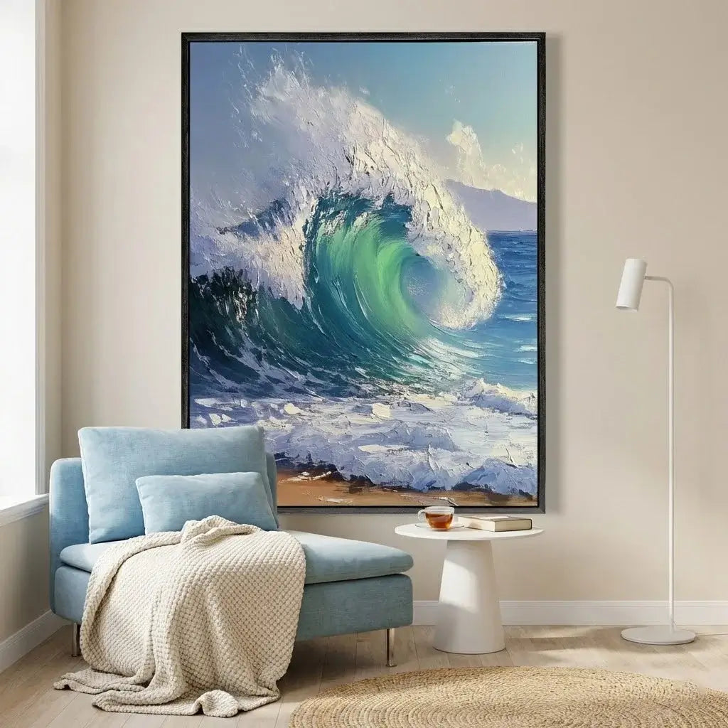Framed artwork of a large wave in a living room with a blue armchair and lamp.