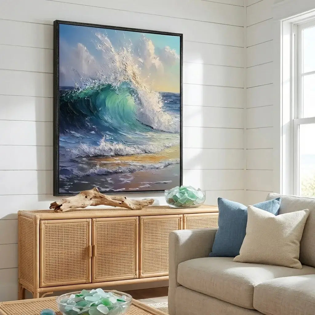 Living room with a wicker cabinet, sofa, and framed ocean painting.