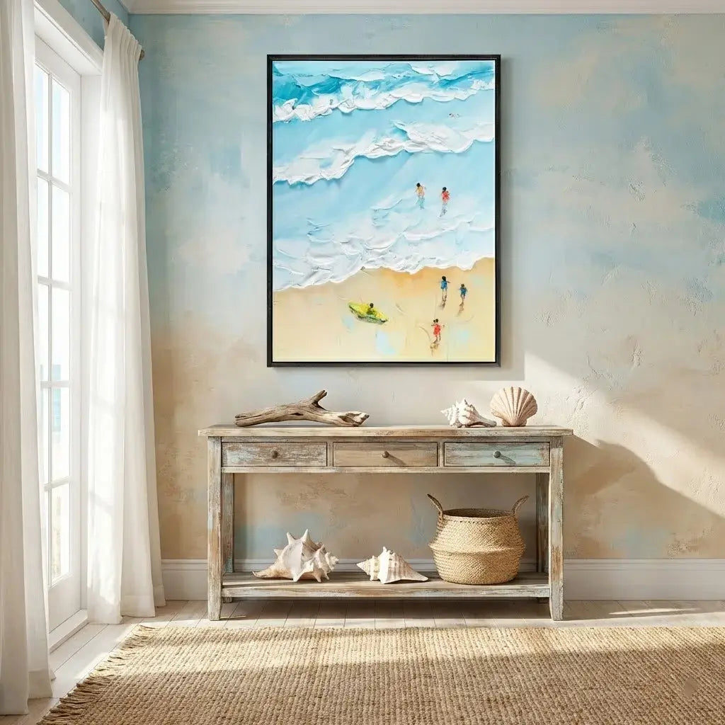Beach-themed wall art above a wooden console table with decorative items.