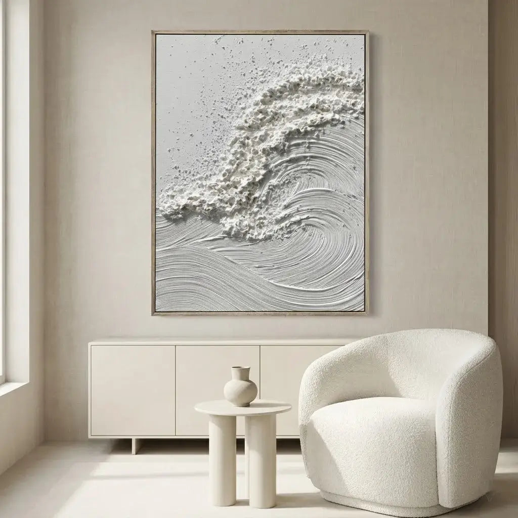 Modern interior with abstract wall art, white chair, and side table.