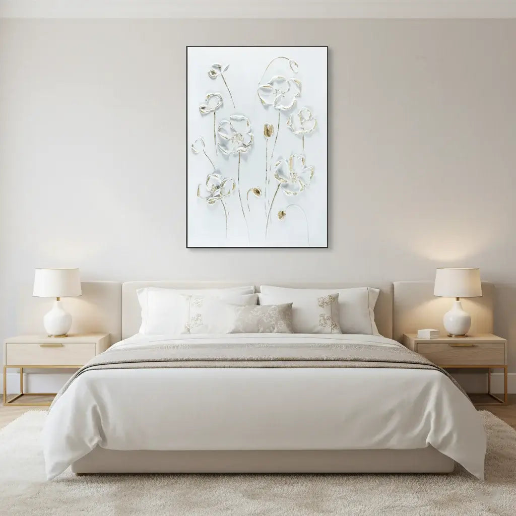 Modern bedroom with a bed, nightstands, and wall art.