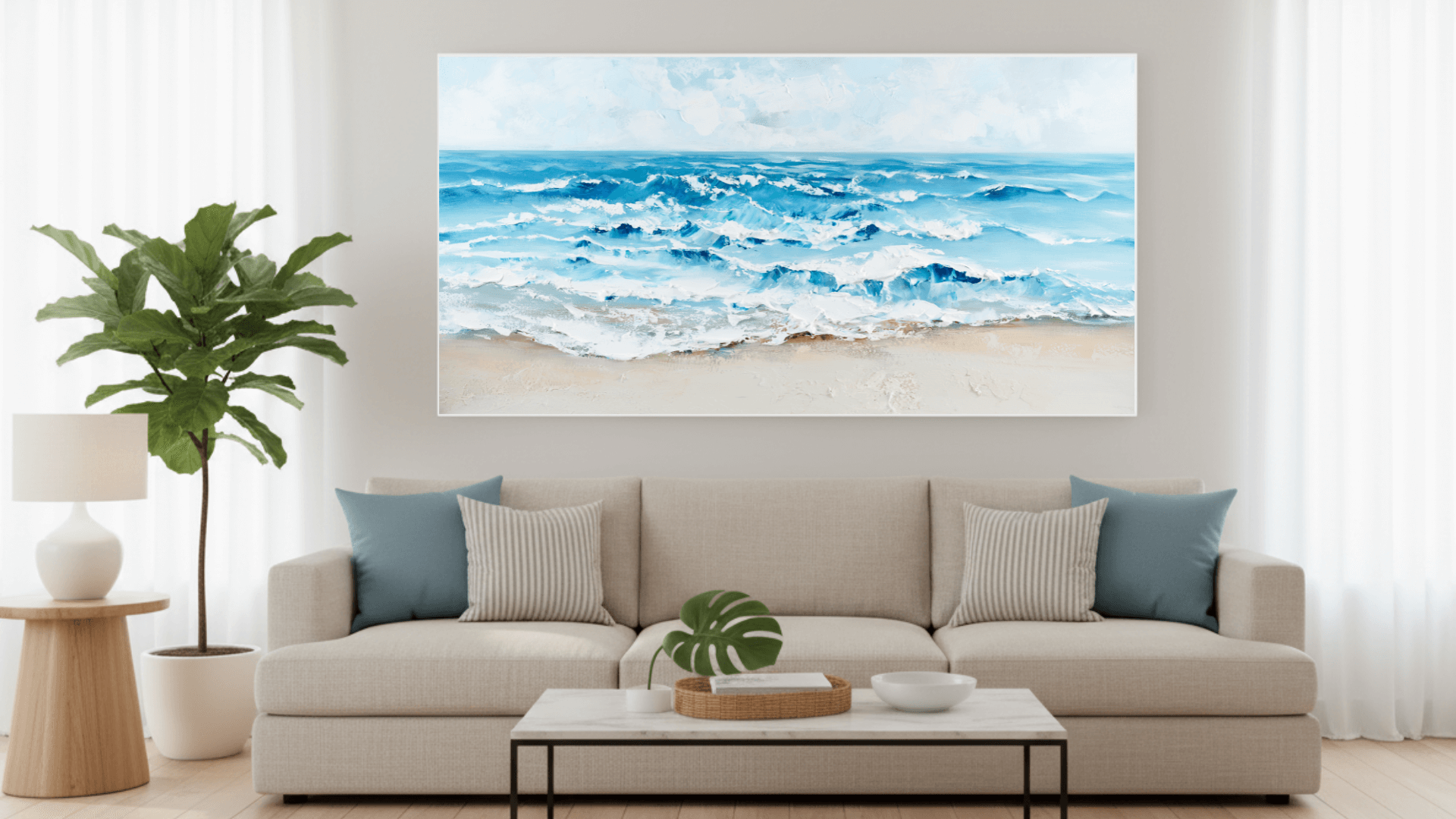 Beige sofa in a living room with a large wall art of ocean waves.