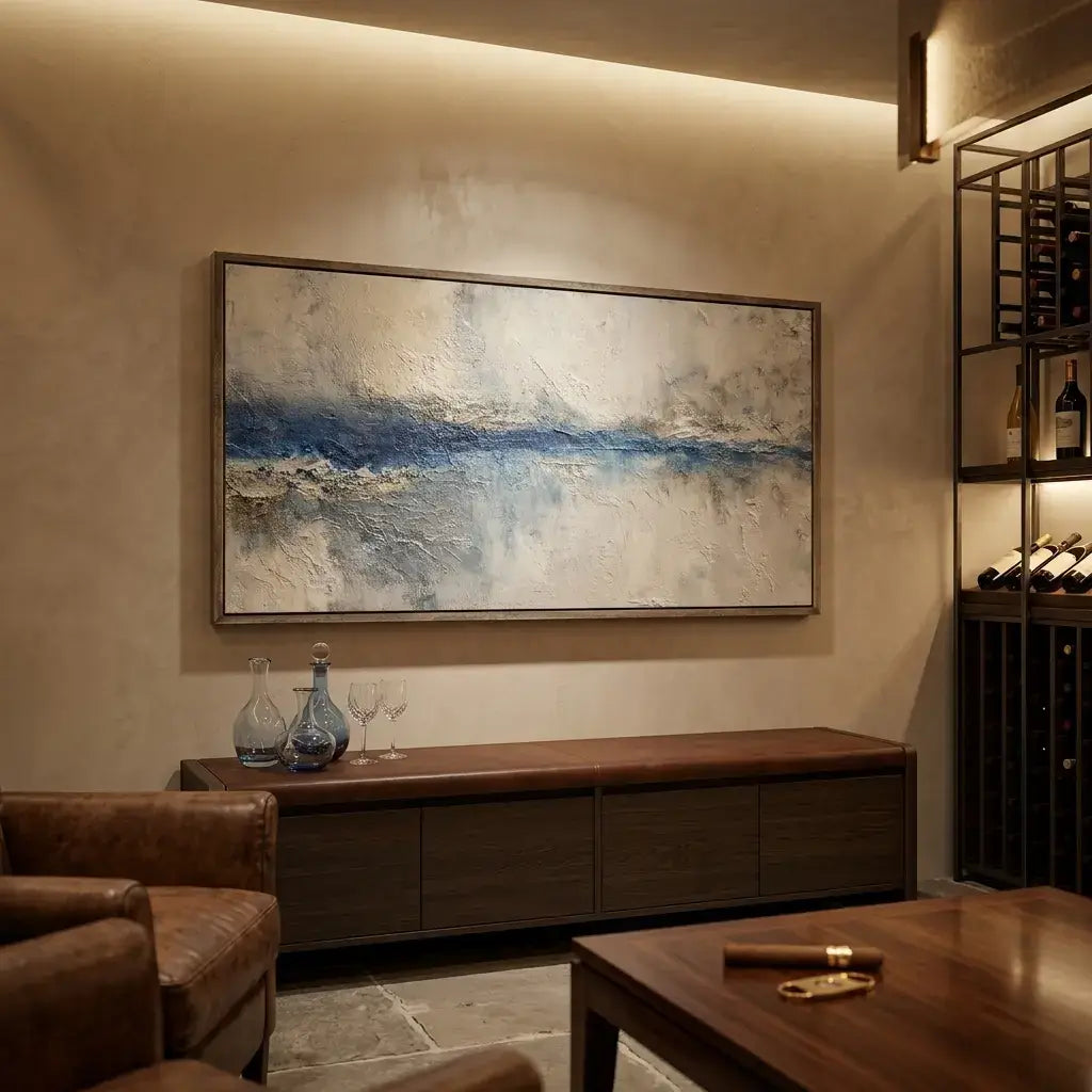 Modern interior with abstract painting, wine bottles, and furniture.