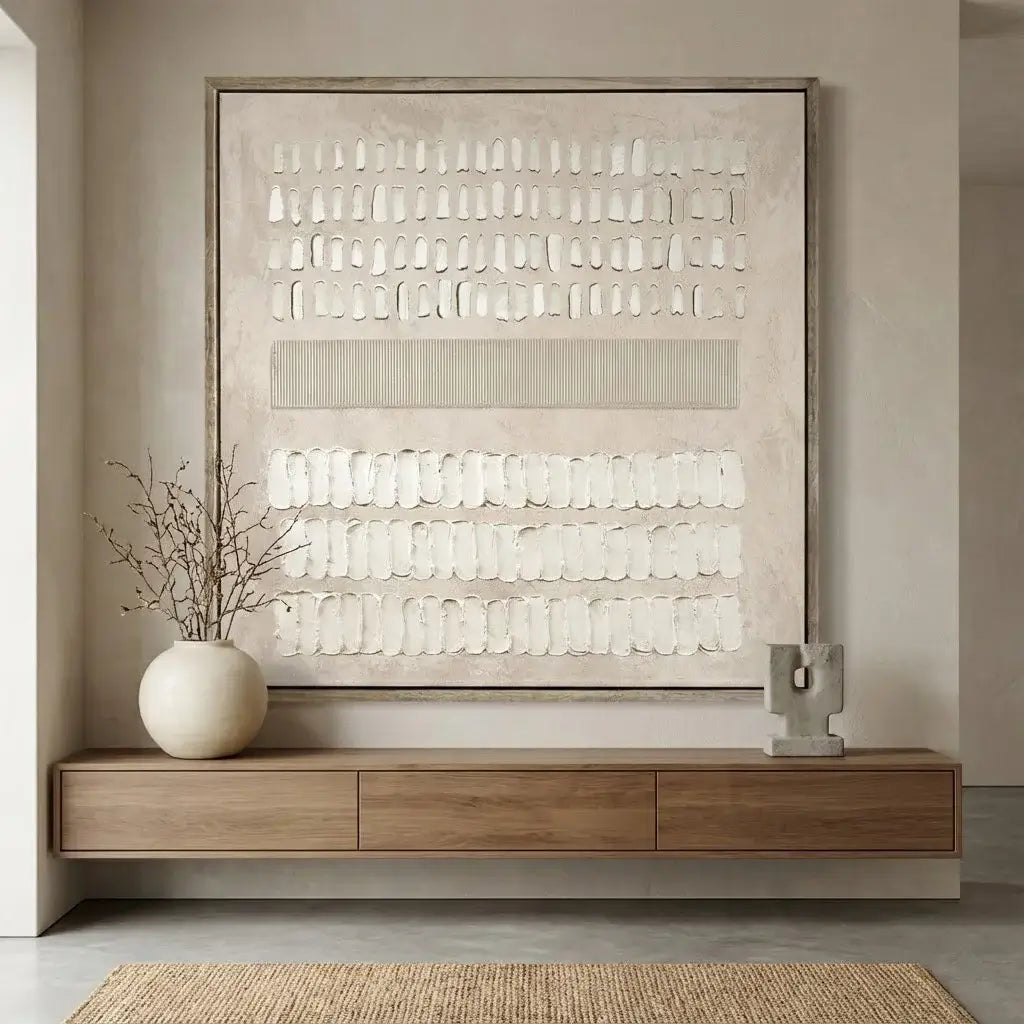 Modern interior with a wooden console table, decorative vase, and abstract wall art.
