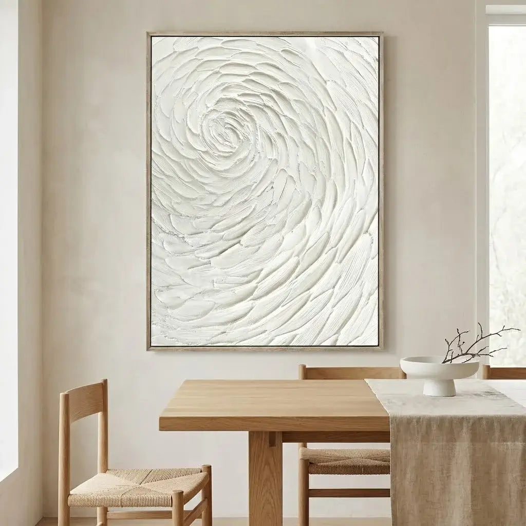 Dining room with a wooden table and chairs, and a large abstract painting on the wall.