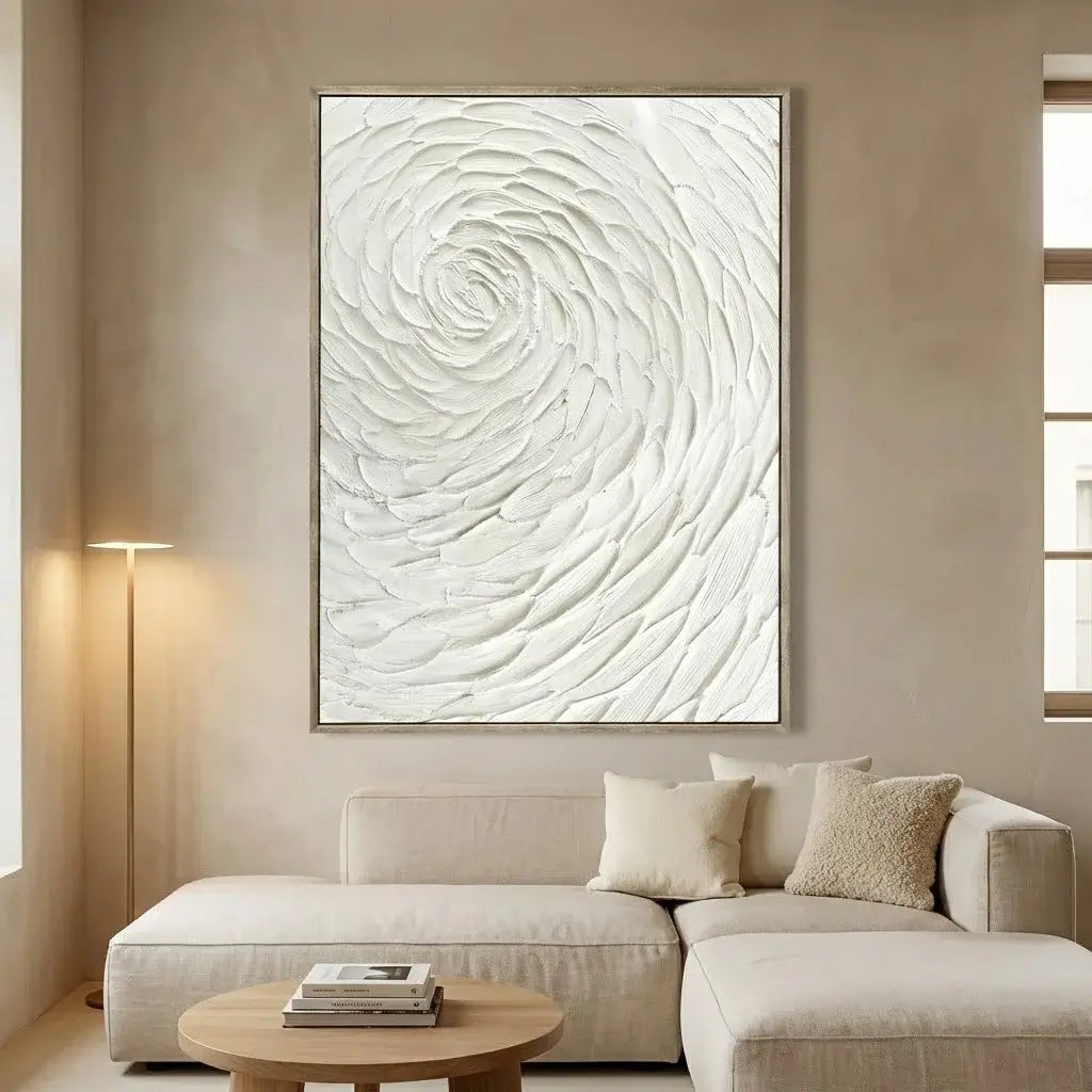 Modern living room with a large abstract painting on the wall above a beige sofa.