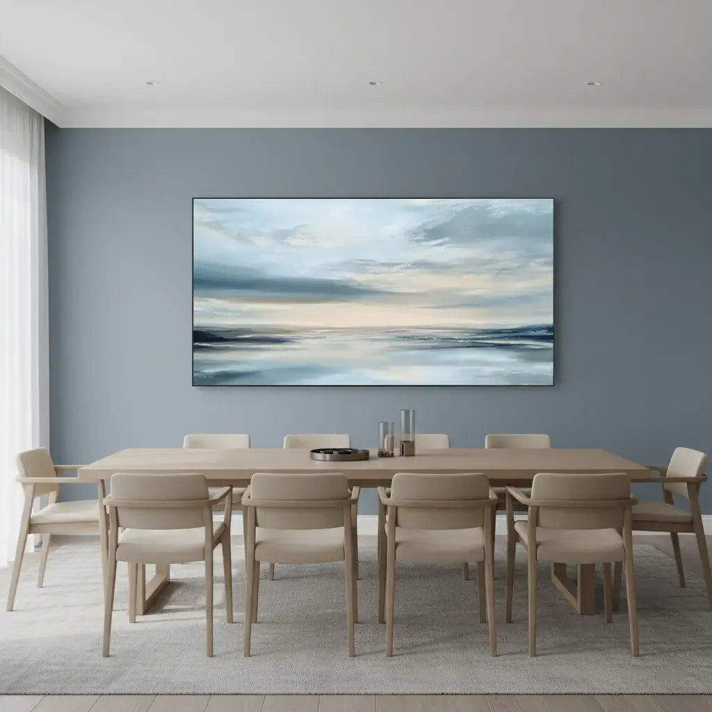 Dining room with a large abstract painting on the wall above a wooden table and chairs.