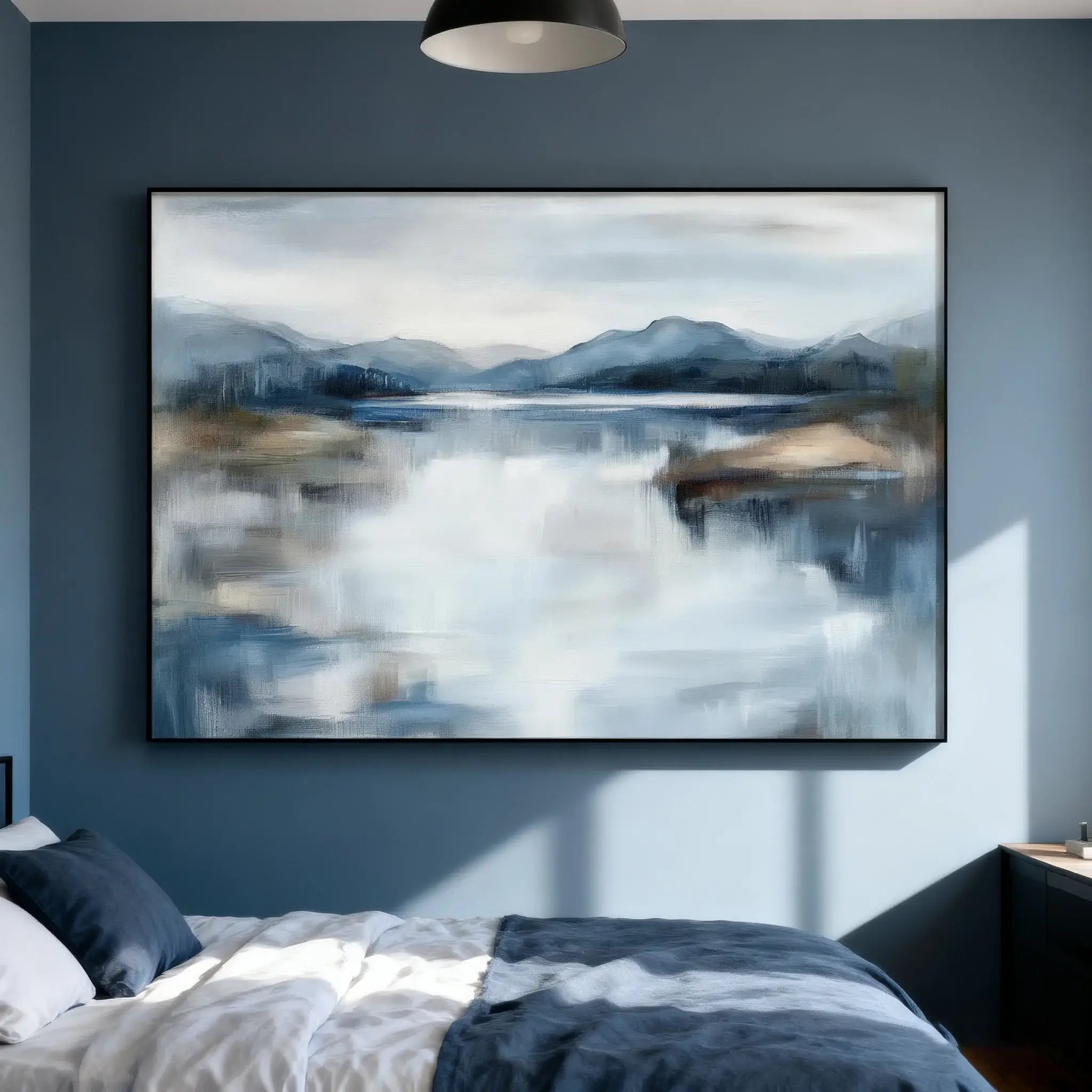 Framed abstract landscape painting on a blue wall above a bed.