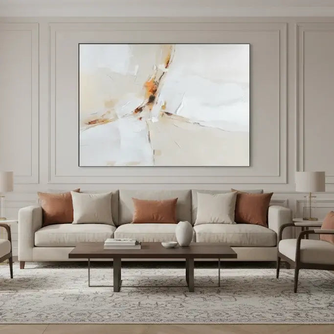 Living room with a beige sofa, abstract painting, and wooden coffee table.