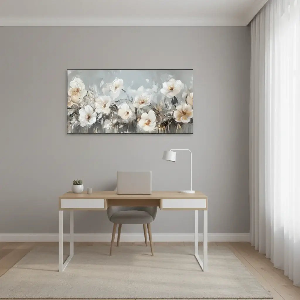 Modern home office with a desk, chair, and floral painting on the wall.