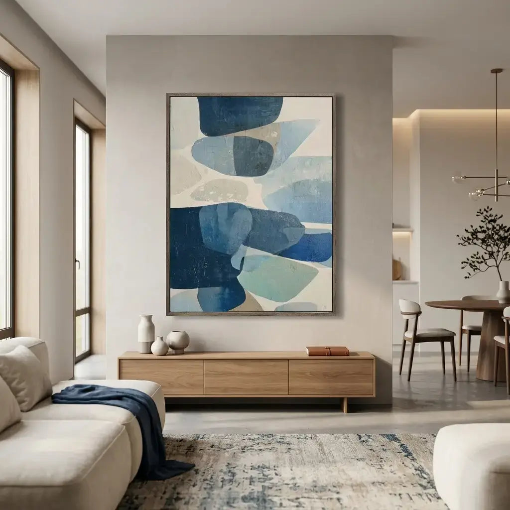 Modern living room with abstract blue artwork on the wall