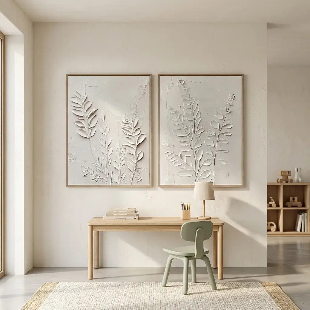 Modern interior with a desk, chair, and wall art in a neutral color scheme.