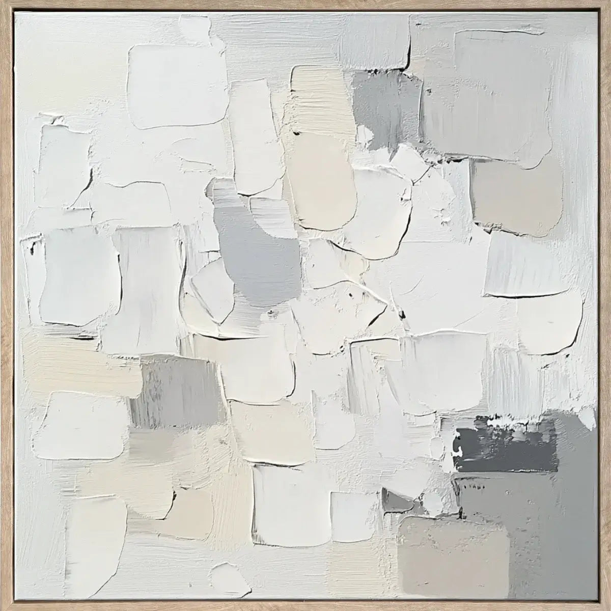 Abstract art piece with white and gray brush strokes in a gold frame.
