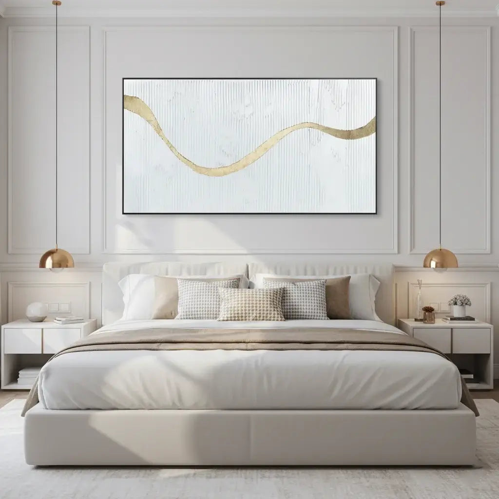Modern bedroom with a bed, nightstands, and abstract wall art.