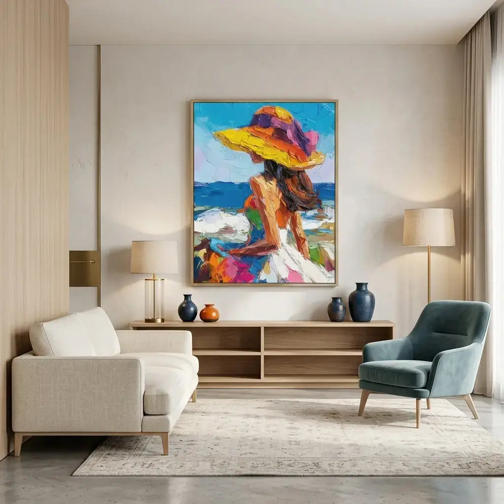 Modern living room with a colorful painting of a woman in a hat, a sofa, and a chair.