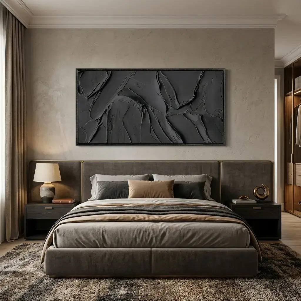 Modern bedroom with a large bed, abstract wall art, and side tables.