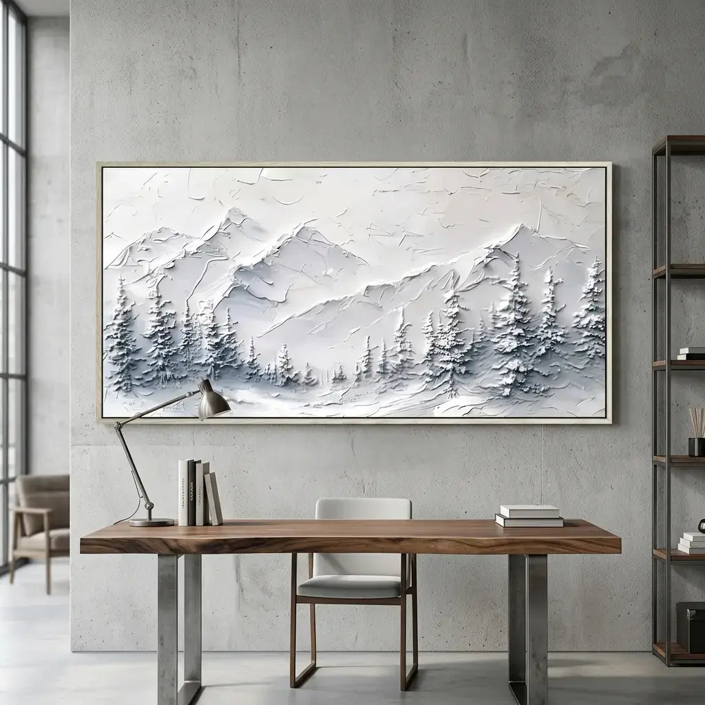 Modern interior with a wooden desk, chair, and abstract mountain painting on a gray wall.