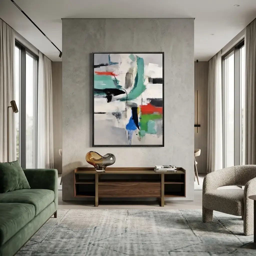 Modern living room with abstract art on the wall, green sofa, and wooden coffee table.