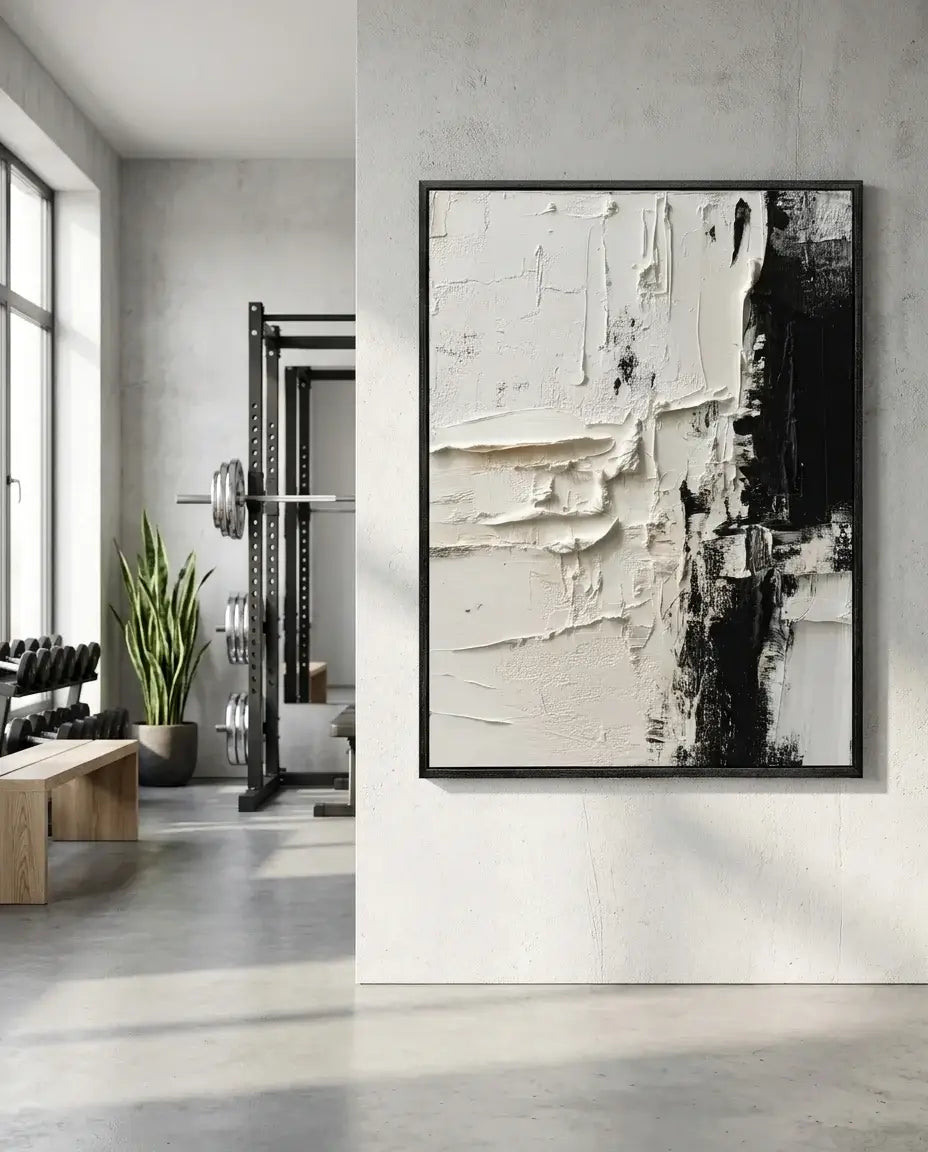 Abstract art piece in a modern interior setting with gym equipment.