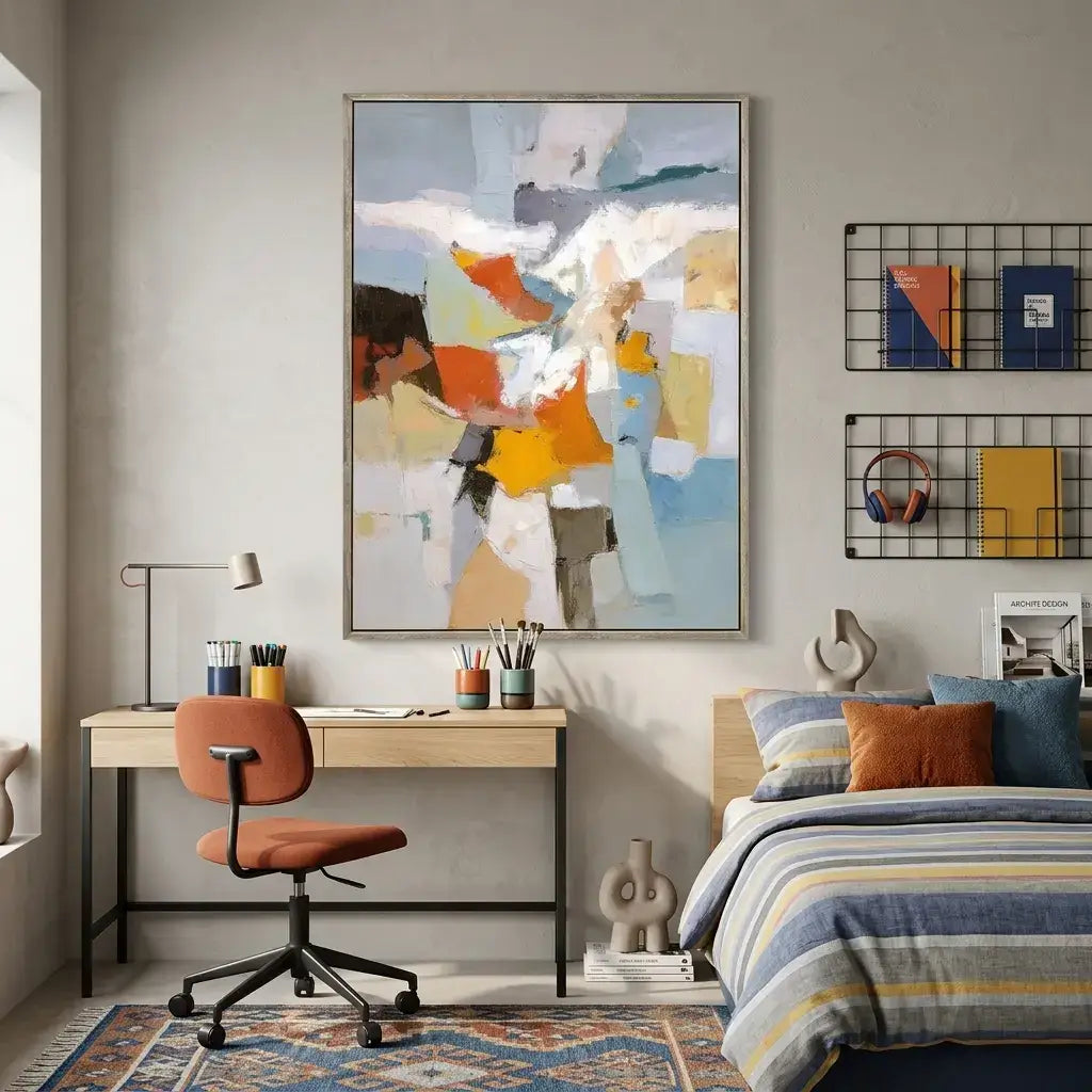 Modern bedroom with a desk, chair, abstract art, and decorative items.
