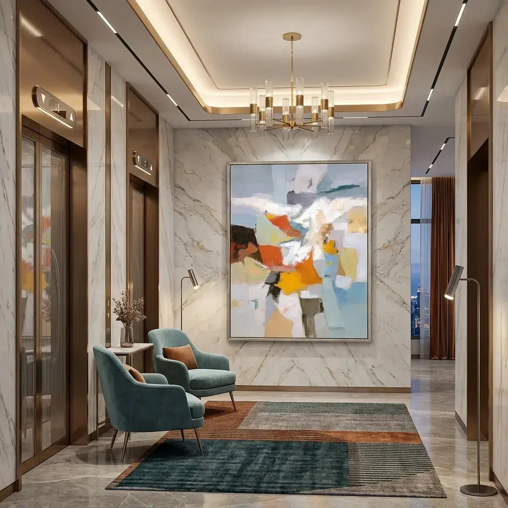 Modern hallway with abstract art, chairs, and decorative elements.