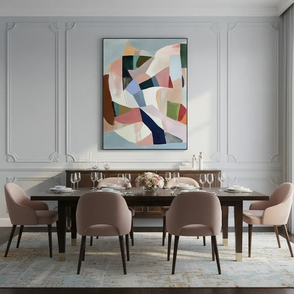Dining room with a long wooden table and four chairs, featuring a colorful abstract painting on the wall.