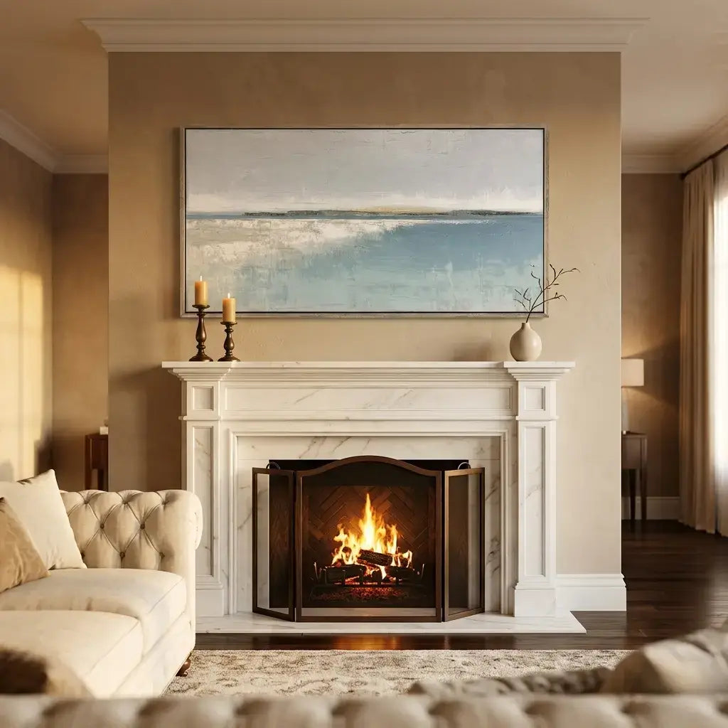 Living room with a fireplace, sofa, and wall art