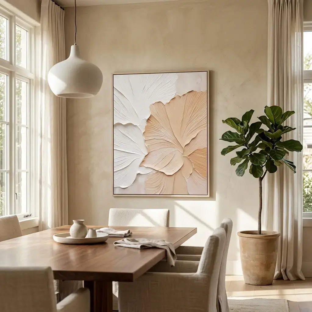 Dining room with a wooden table, chairs, a large abstract floral painting, and a potted plant.