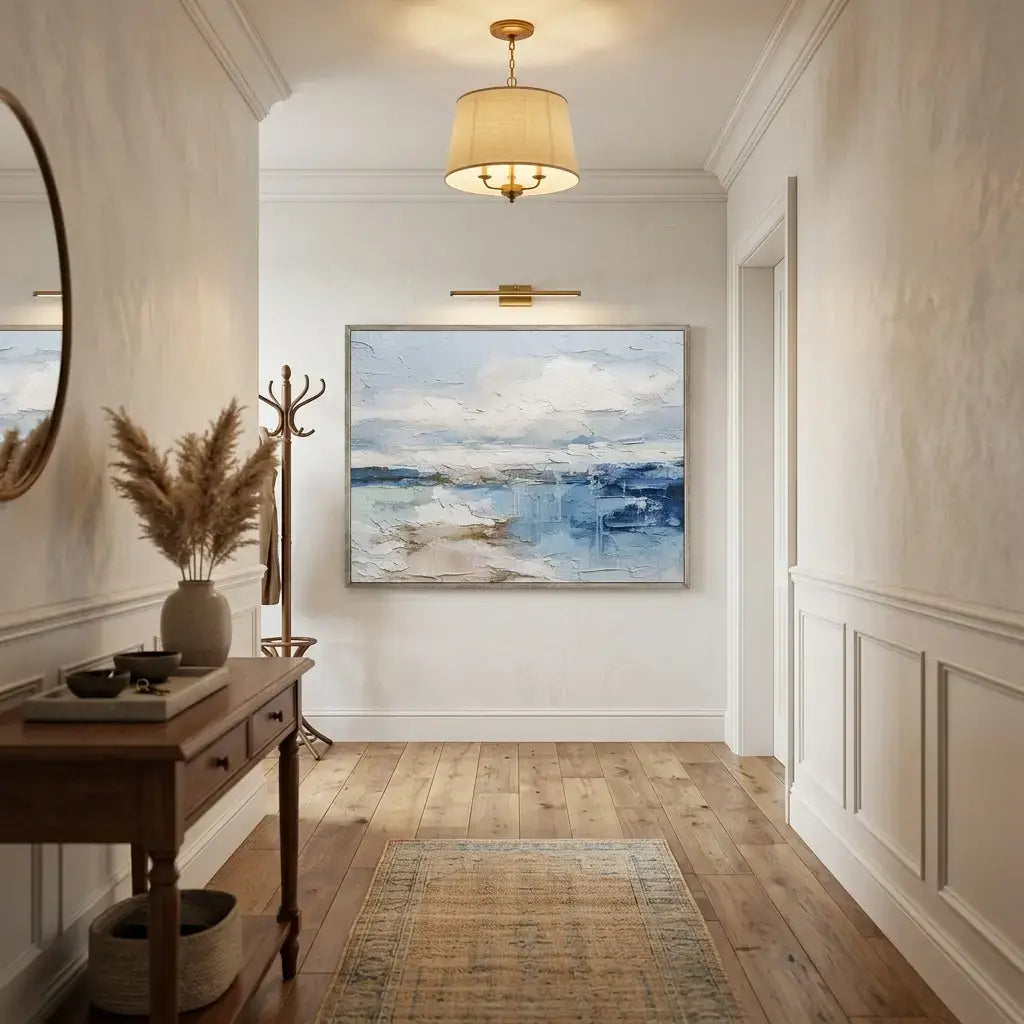 Modern hallway with a painting on the wall, wooden floor, and decorative elements.