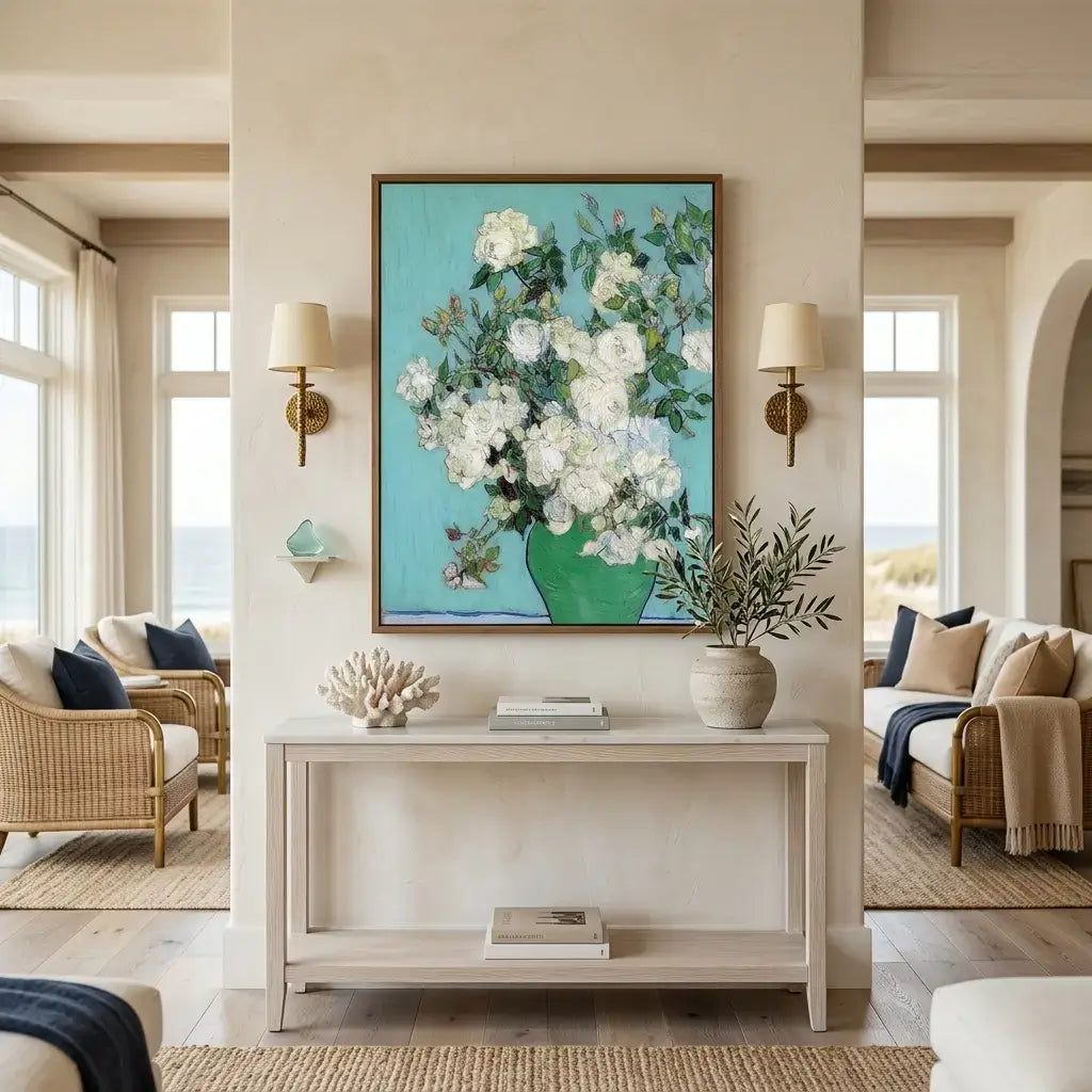 Living room with a large floral painting on the wall, a console table with decor items, and a view of the ocean.
