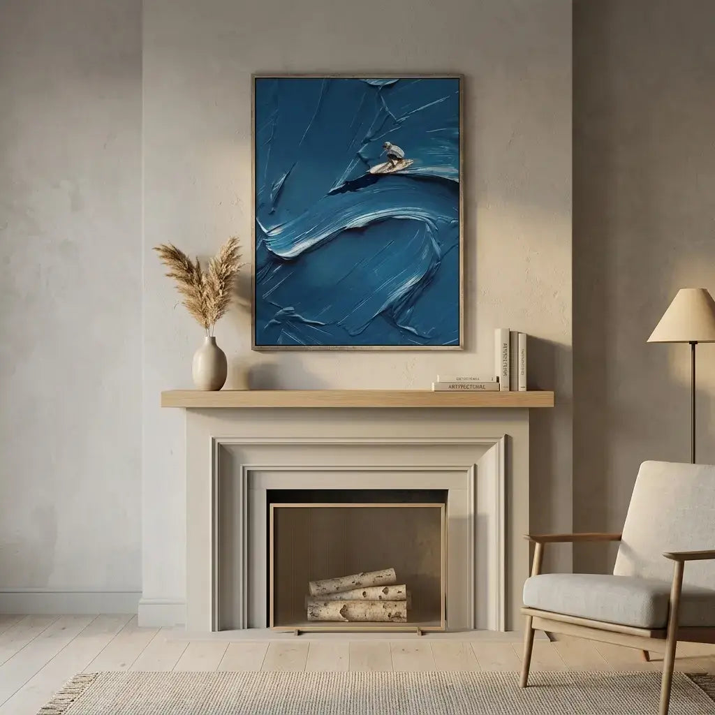 Modern living room with a fireplace, abstract blue painting, and a chair.