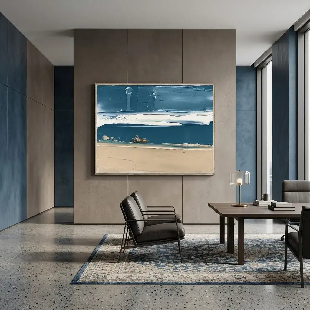 Modern interior with a painting of a beach scene on a wall, chairs, and a table.