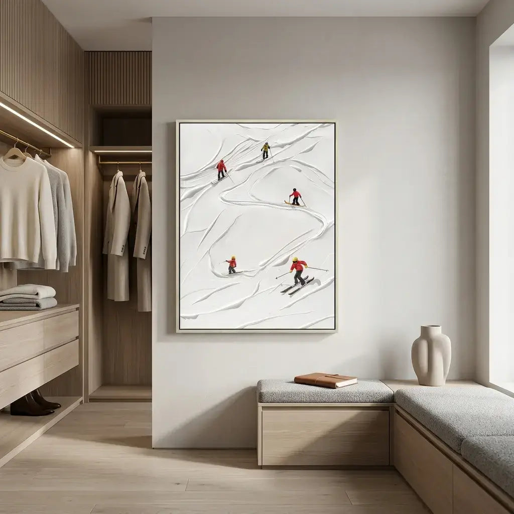 Modern interior with a framed artwork of skiers on a snowy slope, wooden wardrobe, and bench.
