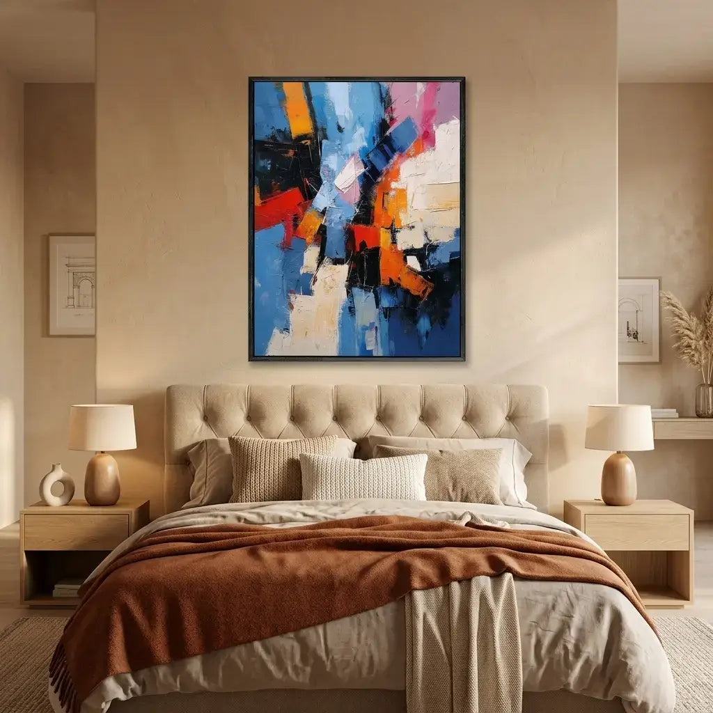 Modern bedroom with a bed, nightstands, and abstract art on the wall.