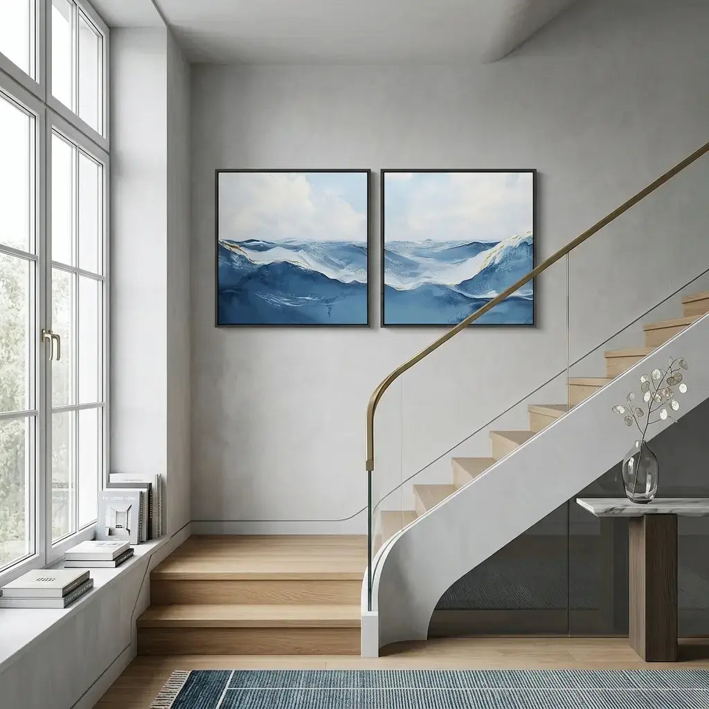 Modern interior with a staircase and wall art depicting blue waves.