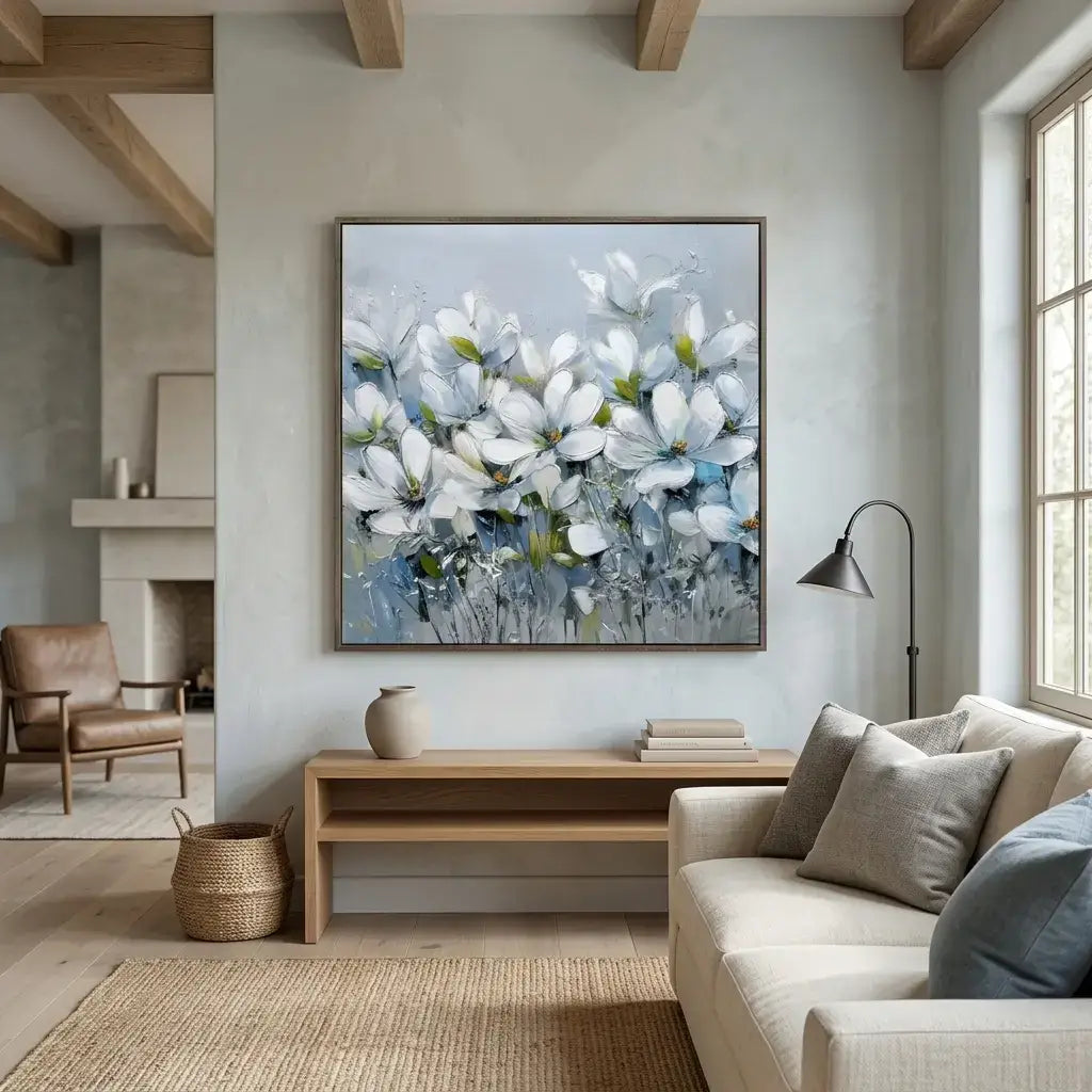 Living room with a large floral painting on the wall, beige sofa, and wooden coffee table.