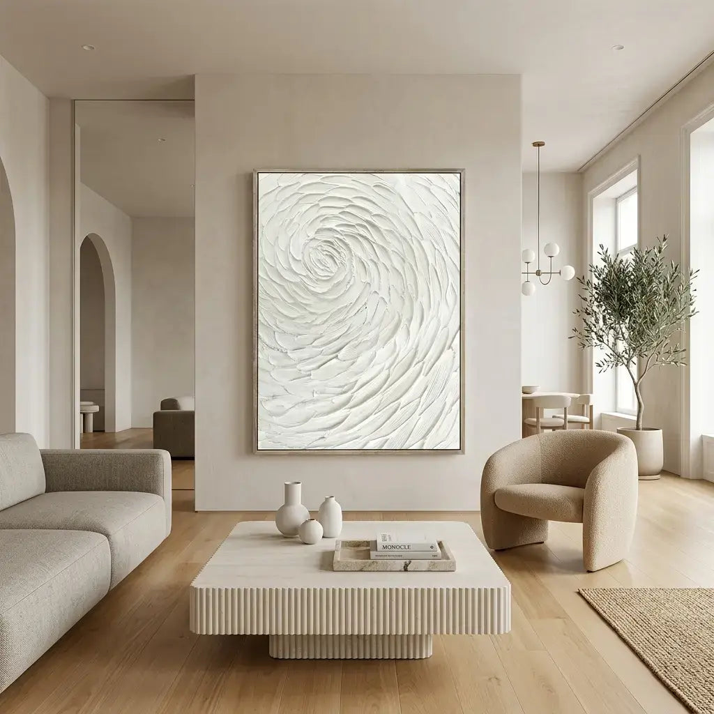 Modern living room with abstract wall art, neutral furniture, and a plant.