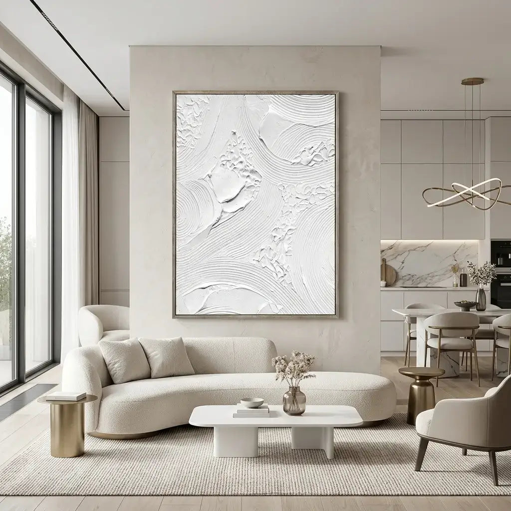 Modern living room with a large abstract painting on the wall, a curved sofa, and a dining area.