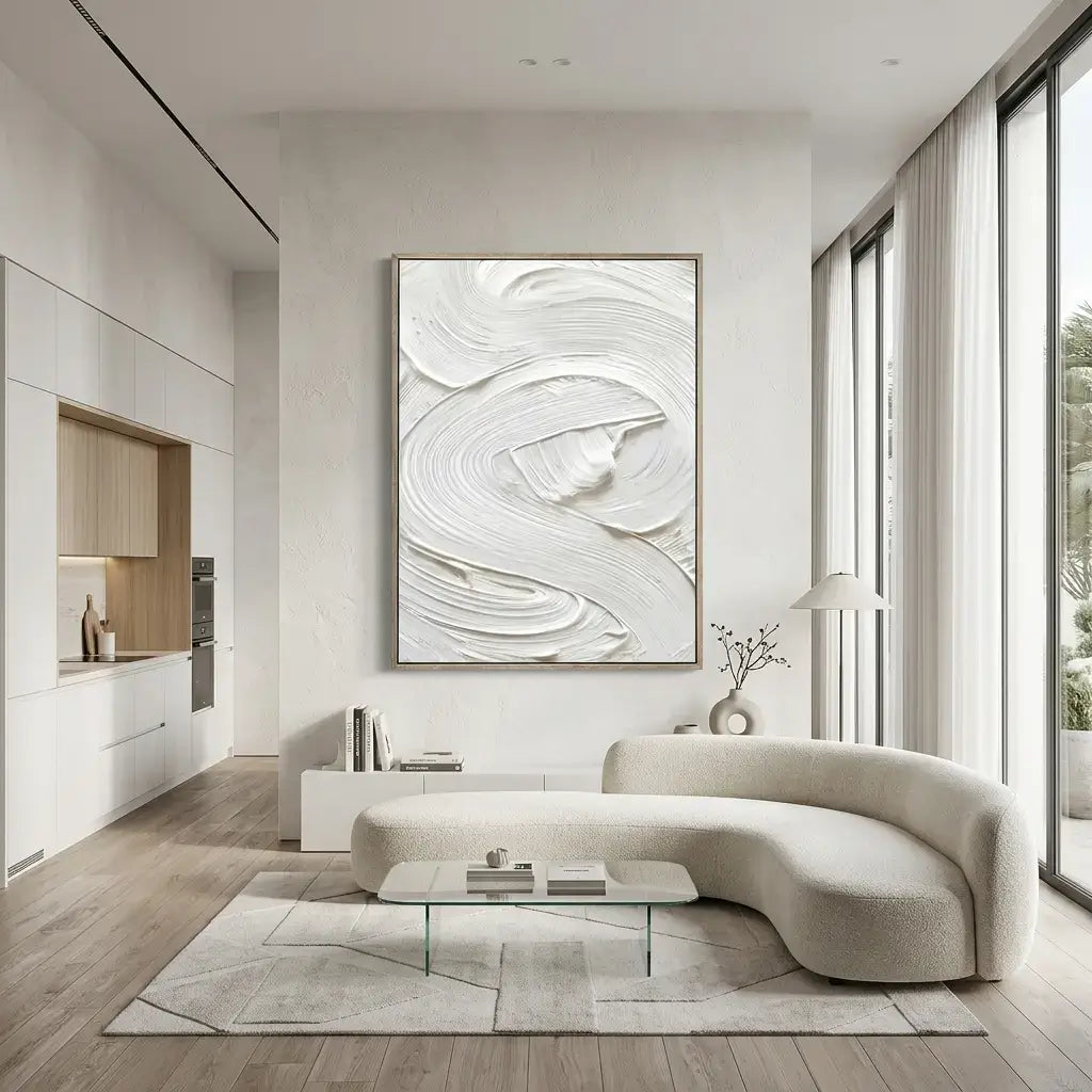 Modern living room with abstract artwork, curved sofa, and large windows.
