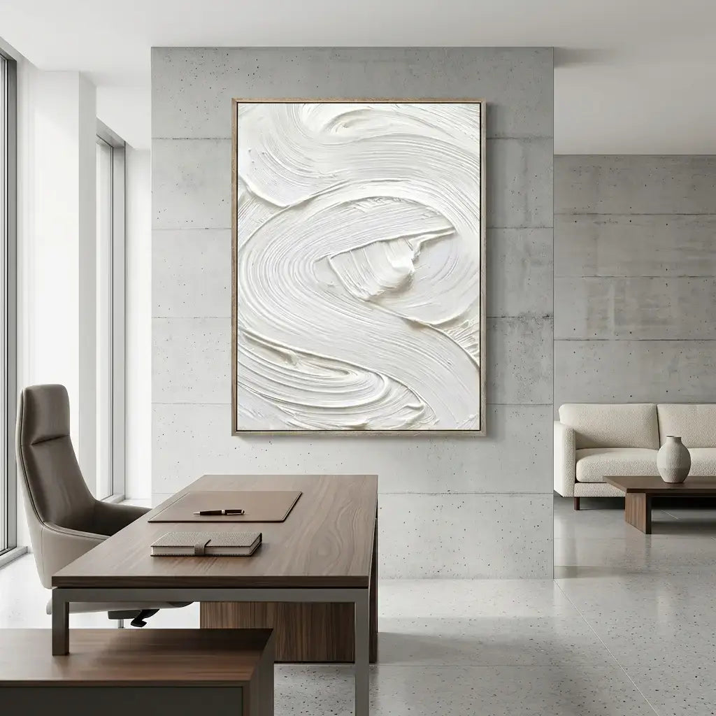 Modern interior with abstract wall art, desk, and sofa.