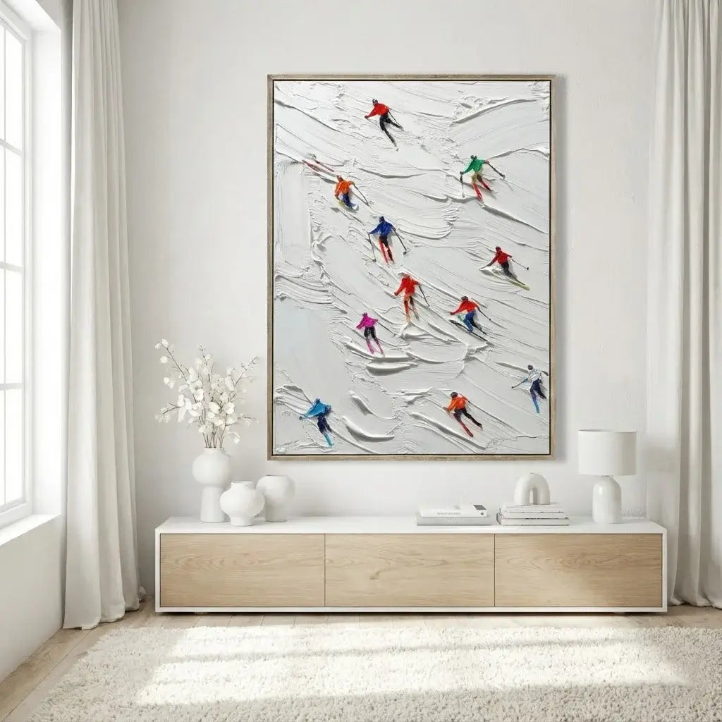 Framed artwork of skiers on a snowy slope in a modern living room.