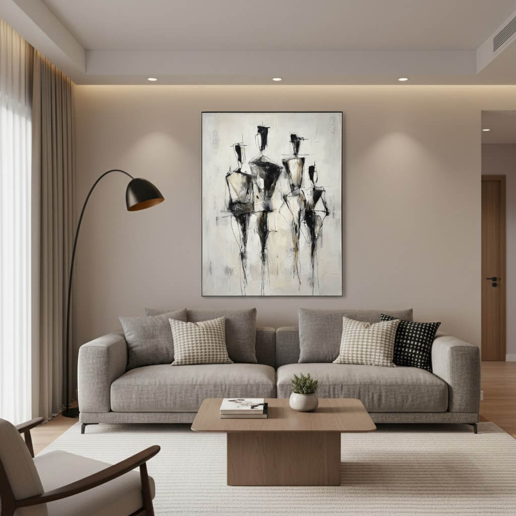 Modern living room with a gray sofa, abstract painting, and decorative items.