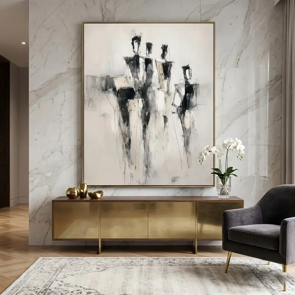 Modern interior with abstract painting, gold console table, and gray armchair.