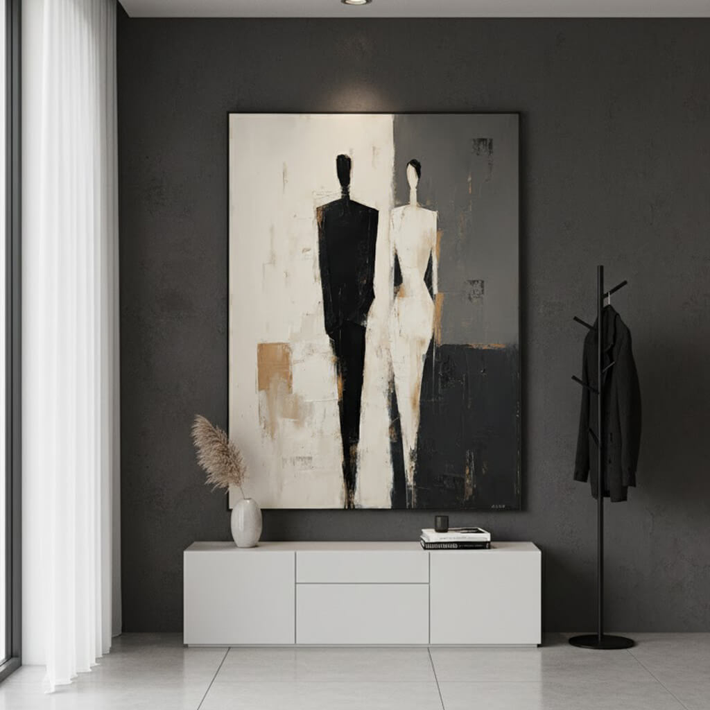 Modern interior with a large abstract painting of two figures on a dark wall.