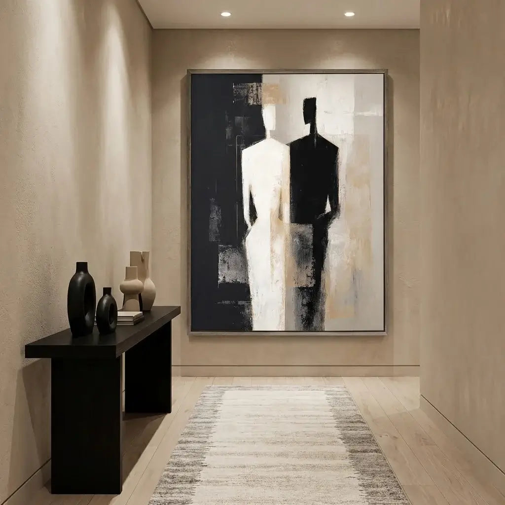 Modern interior with abstract art on the wall and decorative items on a console table.